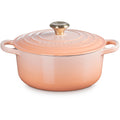 Le Creuset Bräter Signature rund 24 cm mit Goldknopf Peche
